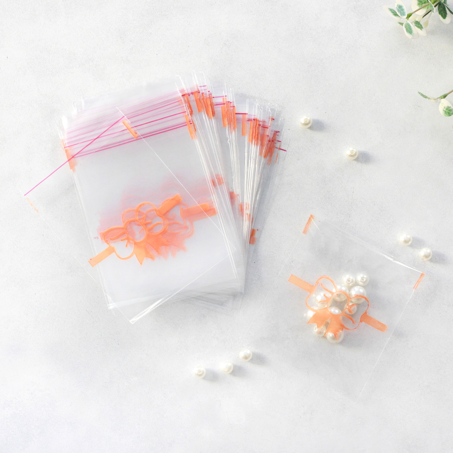 Clear Bag with orange bowknot pattern, adhesive / 10x15 cm (100 pcs) - 2